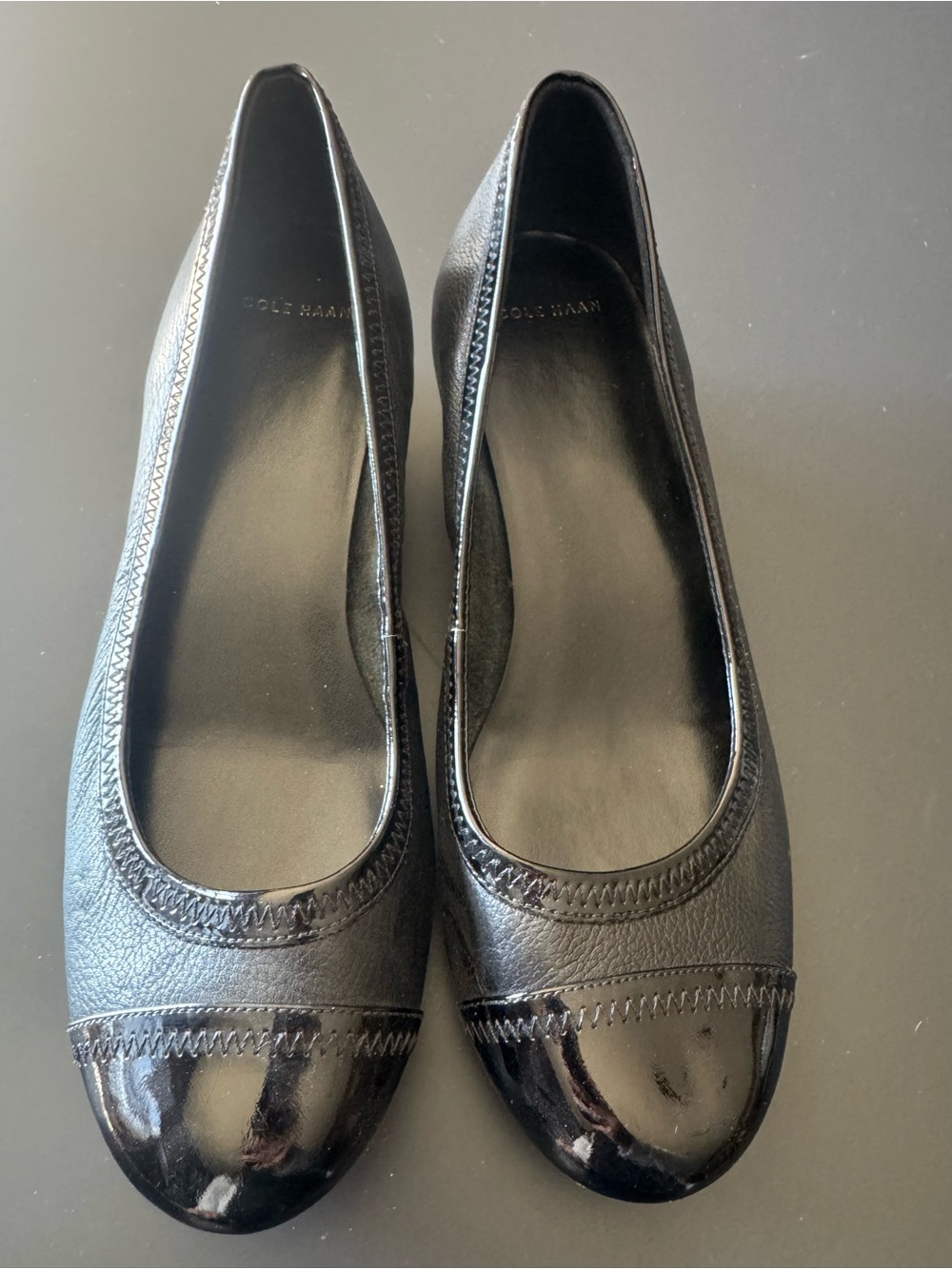 Cole Haan Black Leather wedge with Patent Cap Toe